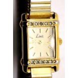 Ladies Limit gold plated stainless steel rectangular wristwatch on expandable bracelet with new
