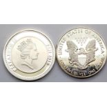 Silver QEII Fiji one dollar coin and a white metal America dollar, cased. P&P Group 1 (£14+VAT for