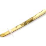Carved Oriental bone cheroot holder, H: 15 cm. P&P Group 1 (£14+VAT for the first lot and £1+VAT for