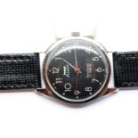 HMT Pilot Parashock mechanical stainless steel black faced wristwatch on a black leather strap.