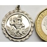 Silver circular St. Christopher medallion . P&P Group 1 (£14+VAT for the first lot and £1+VAT for