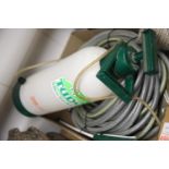 Large length of garden hose and a Tudor 5L garden sprayer. Not available for in-house P&P
