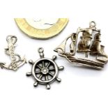 Three silver ship charms. P&P Group 1 (£14+VAT for the first lot and £1+VAT for subsequent lots)