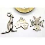 Three vintage silver assorted charms. 2.1g. P&P Group 1 (£14+VAT for the first lot and £1+VAT for