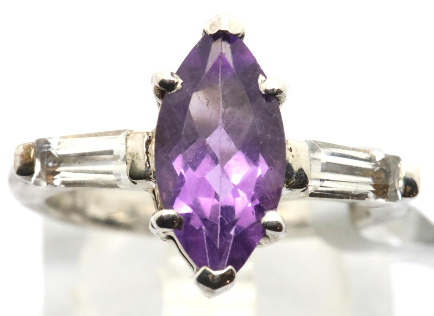 Sterling silver marquise cut amethyst ring with baguette cut topaz shoulders. Size O, 4.7g. P&P