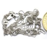 Three 9ct white gold neck chains, tangled, combined 2.7g. P&P Group 1 (£14+VAT for the first lot and