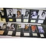 Twelve mounted celebrity photographs with autographs, including Jane Asher, Donald Sinden, Burt