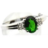 9ct white gold emerald ring with diamond shoulders, size U, 2.2g. P&P Group 1 (£14+VAT for the first