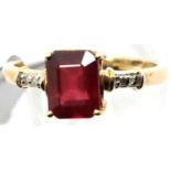 9ct gold emerald cut ruby ring with diamond shoulders, size S/T, 3.1g. P&P Group 1 (£14+VAT for
