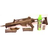Boxed Heckler & Koch G36C gas powered airsoft assault rifle, with two magazines, speed re-loader,