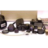 Pentax 110 auto film camera and a quantity of camera related items. P&P Group 3 (£25+VAT for the