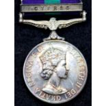 GSM Cyprus medal with clasp and ribbon. Attributed to Sgt McGreevy R.E. around rim. P&P Group 1 (£