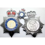 Sussex Police pressed metal helmet plate, Humberside Police enamelled helmet plate and Humberside
