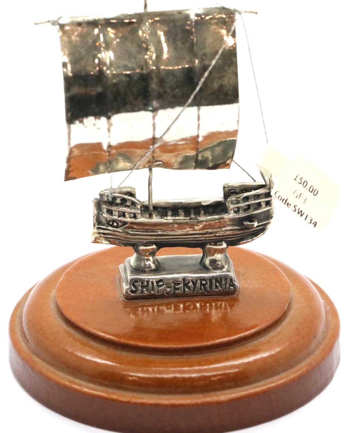 Sterling silver ship of Kyrenia, mounted on a turned plinth, H: 10 cm. P&P Group 1 (£14+VAT for