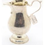 Victorian hallmarked silver cream jug, Chester assay 1897, H: 9 cm, 78g. P&P Group 1 (£14+VAT for