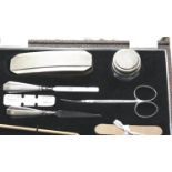 George V Art Deco hallmarked silver manicure set, Birmingham assay 1935, of seven pieces. P&P