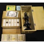 Cased Philo zoom 750x microscope and quantity of glass slides. P&P Group 3 (£25+VAT for the first