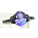 9ct white gold tanzanite and blue diamond ring. With certificate, size O, 2.3g. P&P Group 1 (£14+VAT