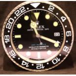 Dealers point of sale wall clock with sweeping second hand, black GMT master dial, working at