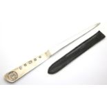 Elizabeth II hallmarked silver letter opener made for the Queen's Silver Jubilee with stitched black