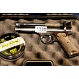 Webley Premier .22 Air pistol in good condition with plastic case and pellets. P&P Group 2 (£18+