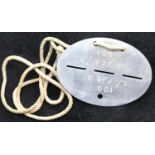 German WWII type Wehrmacht dog tag disc. P&P Group 1 (£14+VAT for the first lot and £1+VAT for