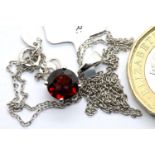 Sterling silver Cuamba garnet pendant necklace, with certificate, chain L: 63 cm. P&P Group 1 (£14+