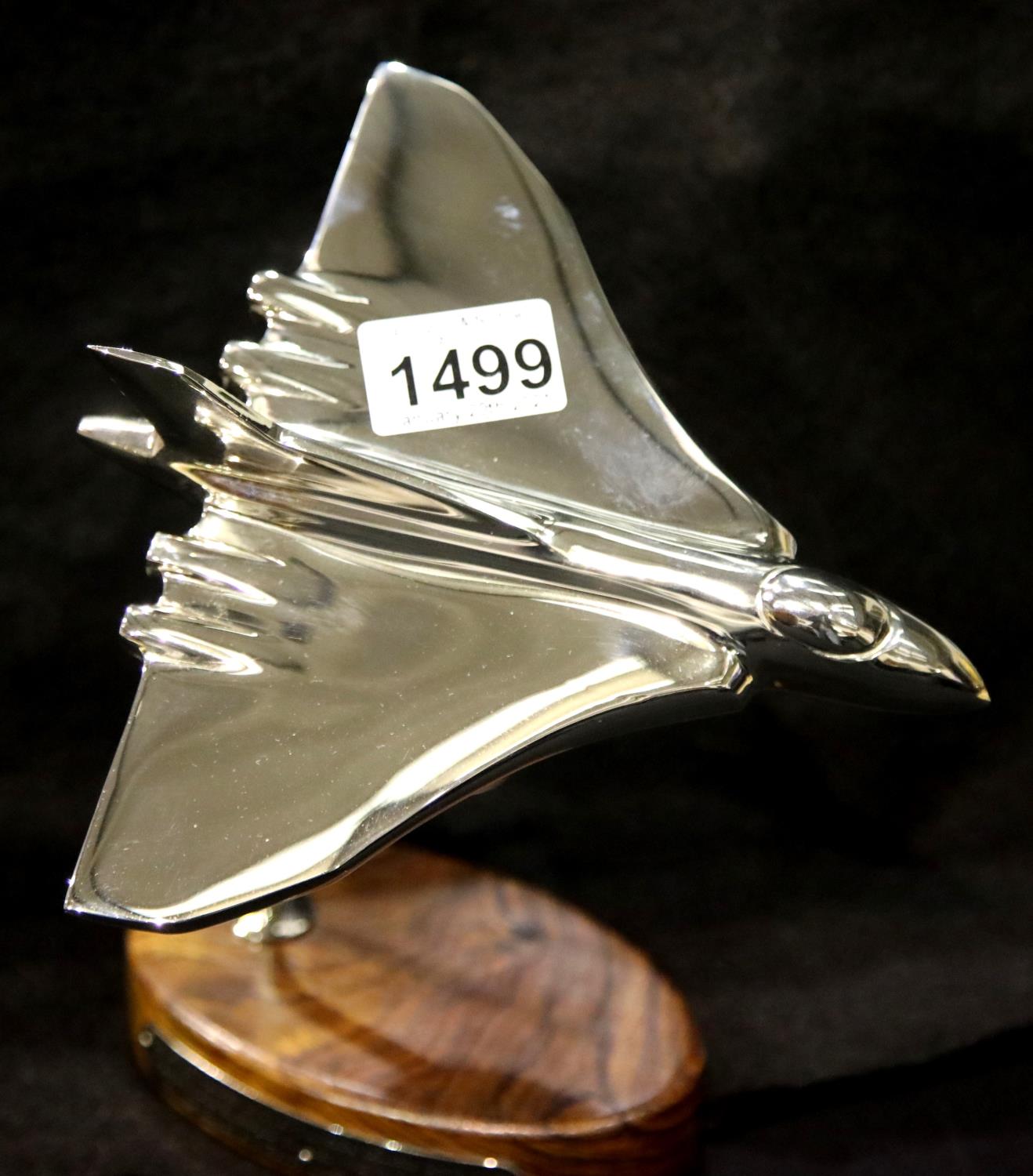 Chrome Avro Vulcan Bomber on elm base, H: 22 cm. P&P Group 3 (£25+VAT for the first lot and £5+VAT