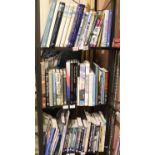 Three shelves of aircraft related hardback books. P&P on this lot does not fall into our postage