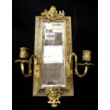 A 19th century rectangular Girandole bevelled mirror, the frame in cast brass with two candle