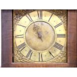 An 18th century single hand oak cased brass faced longcase clock by Rogers, Leominster, chain driven