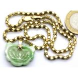 Jade and 925 silver gilt necklace, chain L: 44 cm, pendant L: 2.5 cm, total 12.5g. Clasp fully