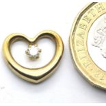 9ct gold heart pendant set with a single white stone, 0.5g, L: 14 mm. P&P Group 1 (£14+VAT for the