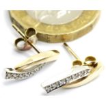 Ladies vintage 9ct gold seven stone diamond stud earrings, 1.7g. P&P Group 1 (£14+VAT for the