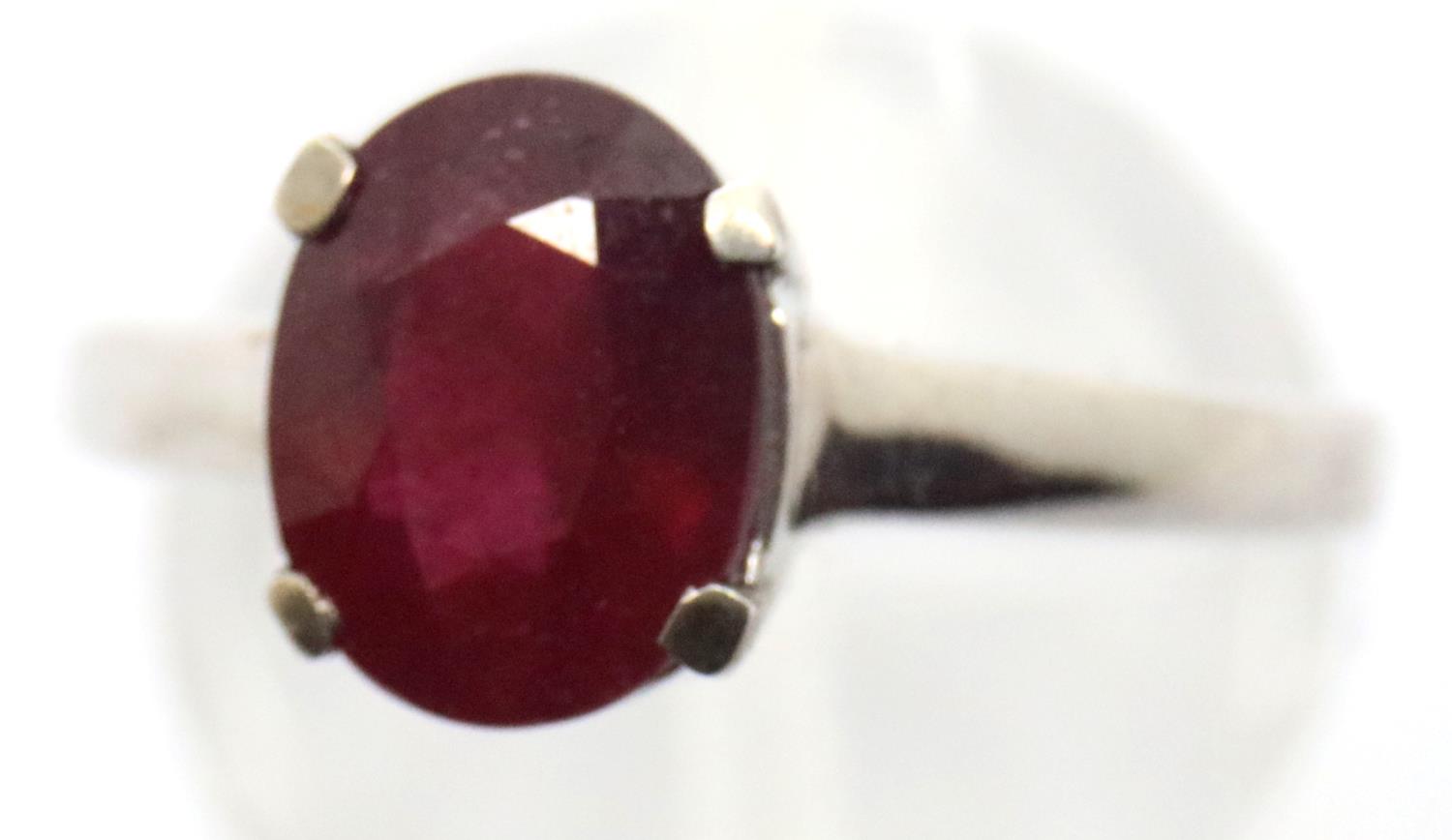 Sterling silver ruby solitaire ring. Size P, 2.8g. P&P Group 1 (£14+VAT for the first lot and £1+VAT