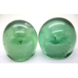 Two antique Victorian glass dump paperweights, both with single flower, H: 10 cm. P&P Group 2 (£18+