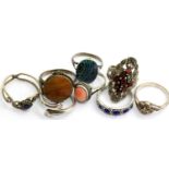 Eight silver and presumed silver rings, mostly stone set, combined 28g. P&P Group 1 (£14+VAT for the