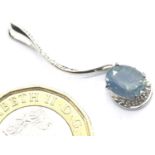 Presumed 9ct white gold pendant set with a blue stone. L: 3 cm, 1.2g. P&P Group 1 (£14+VAT for the