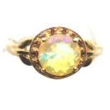 9ct yellow gold Ethiopian opal and red diamond ring, with certificate, size O, 2.7g. P&P Group 1 (£