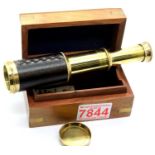 Cased two draw brass telescope in a Nautical themed box. P&P Group 1 (£14+VAT for the first lot