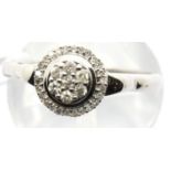 9ct white gold diamond halo ring, size O, 1.6g. Condition report: attached tag says made in India,