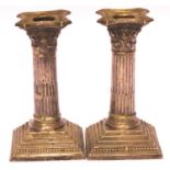 Pair of Victorian hallmarked silver weighted candlesticks, London assay 1894, 667g. P&P Group 1 (£