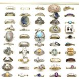 Fifty silver rings including gold plated and stone set examples, in presentation box. P&P Group