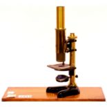 E Leitz Wetzlar Brass Microscope in lockable fitted case, complete with all original lenses and some