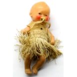 Antique German ceramic baby figurine with original clothing. P&P Group 1 (£14+VAT for the first