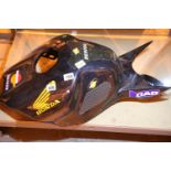 Modern fiberglass Honda Viper motorcycle tank cover and a matching fairing screen. Not available for