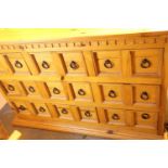 Pine nine drawer sideboard, 143 x 48 x 92 cm. Not available for in-house P&P, contact Paul O'Hea
