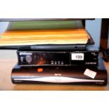 Sky HD box and Proline portable DVD player (unchecked) and pre printed blank album of Polish stamps,
