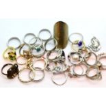 Collection of silver coloured dress rings and sixteen mixed fashion rings. P&P Group 1 (£14+VAT