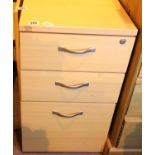 Three door beech effect filing cabinet, 72 x 80 x 43 cm and pine effect four section mirror, 28 x 23